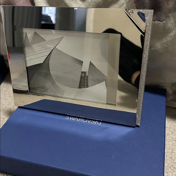 Swarovski tabletop picture frame with beautiful bedazzled edge.
